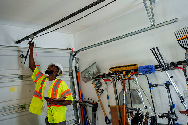 Professional Garage Door Panel Replacement technician working in Okmulgee, OK